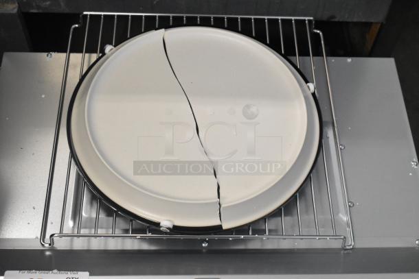 Stainless steel microwave convection oven, cracked plate shown on rack. Model: KoolMore KM-CWO30-SS, brand new, scratch and dent.