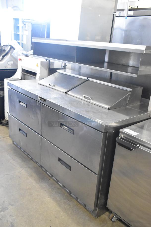 Delfield stainless steel sandwich salad prep table, 4 drawers, over shelf, 115V, used condition.