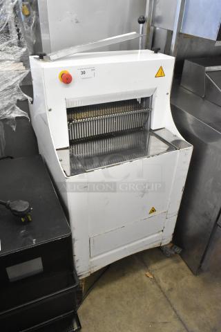 2018 Doyon CPF412 bread loaf slicer on casters, 115V, 1 phase; white metal body, visible wear, commercial setting.
