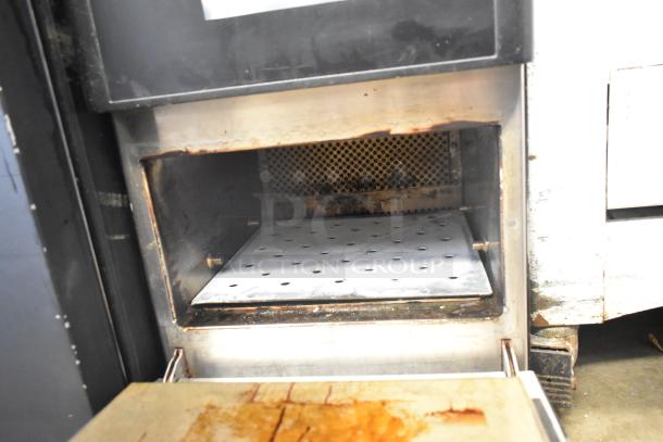 Turbochef Rapid Cook Oven, metal, commercial countertop, electric, 208/240V, 1 phase, used. Interior visible with wear.