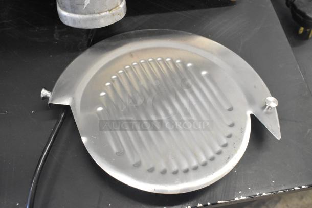 Berkel Metal Commercial Countertop Meat Slicer, 115 Volts, 1 Phase. Features metal construction, good condition.