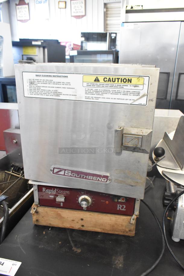 Southbend R2 stainless steel countertop steam cabinet, electric, single deck, 208V, 3 phase, daily cleaning instructions visible.