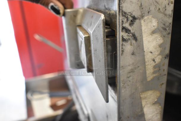 Southbend R2 stainless steel steam cabinet handle, showing wear. Electric, 208V, 3-phase. Suitable for commercial use.