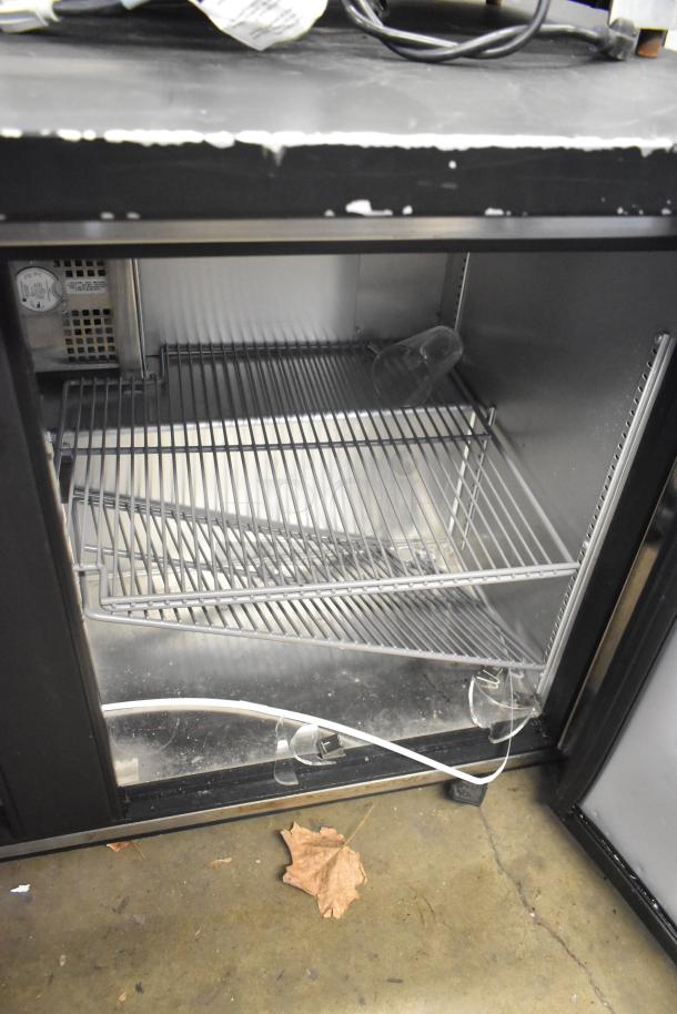 2018 True TUC-48-LP-HC commercial undercounter cooler, two doors, interior shelves, 115V, visible wear on edges.