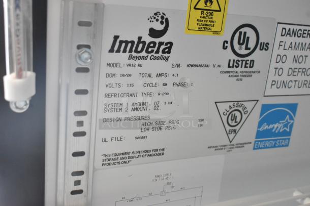 Imbera VR12 metal commercial single-door reach-in cooler merchandiser label, showing model, volts, phase, and refrigerant type.