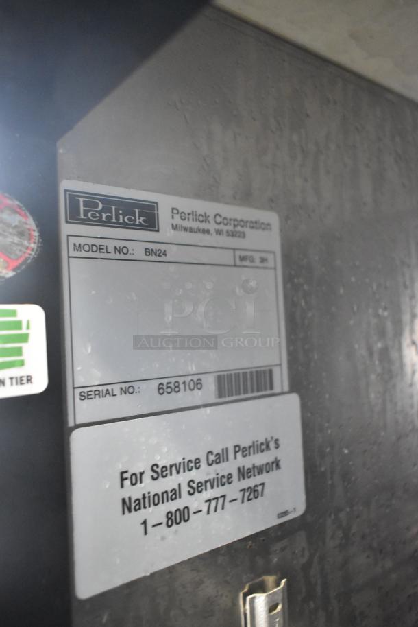 Perlick BN24 stainless steel undercounter cabinet, single door, missing leg. Serial: 658106. Model label visible.