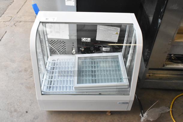 BRAND NEW KoolMore CDC-3C-WH Countertop Display Refrigerator, 3.6 Cu Ft, 115V. Scratch and dent condition visible.
