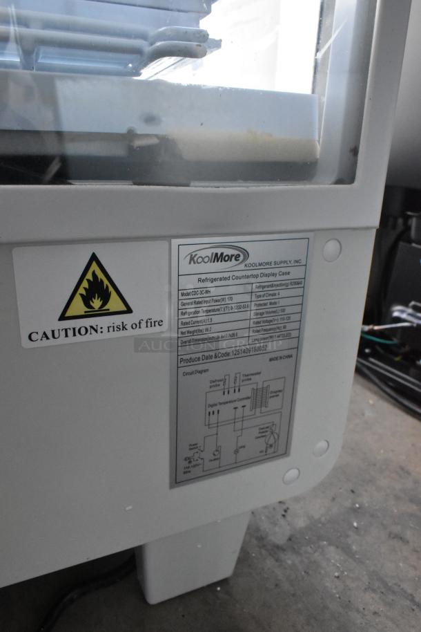 BRAND NEW SCRATCH AND DENT! KoolMore CDC-3C-WH Countertop Display Refrigerator, 3.6 Cu Ft, 115V, label details and caution sign visible.