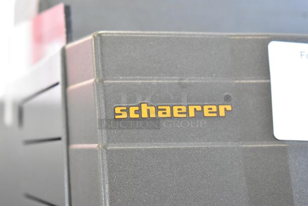 Schaerer Ambiente Espresso Machine, commercial countertop model, metal finish, 210 volts, 1 phase. Logo visible.