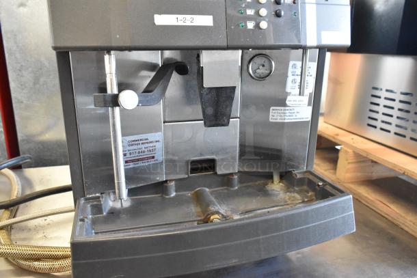 Schaerer Ambiente metal commercial countertop espresso machine, 210V, 1-phase. Features visible controls, labels for repairs.