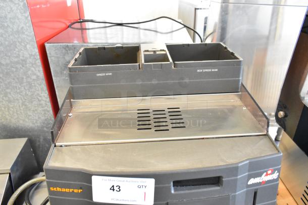 Schaerer Ambiente metal commercial countertop espresso machine, 210V, 1 phase, used condition, labeled for espresso and decaf beans.