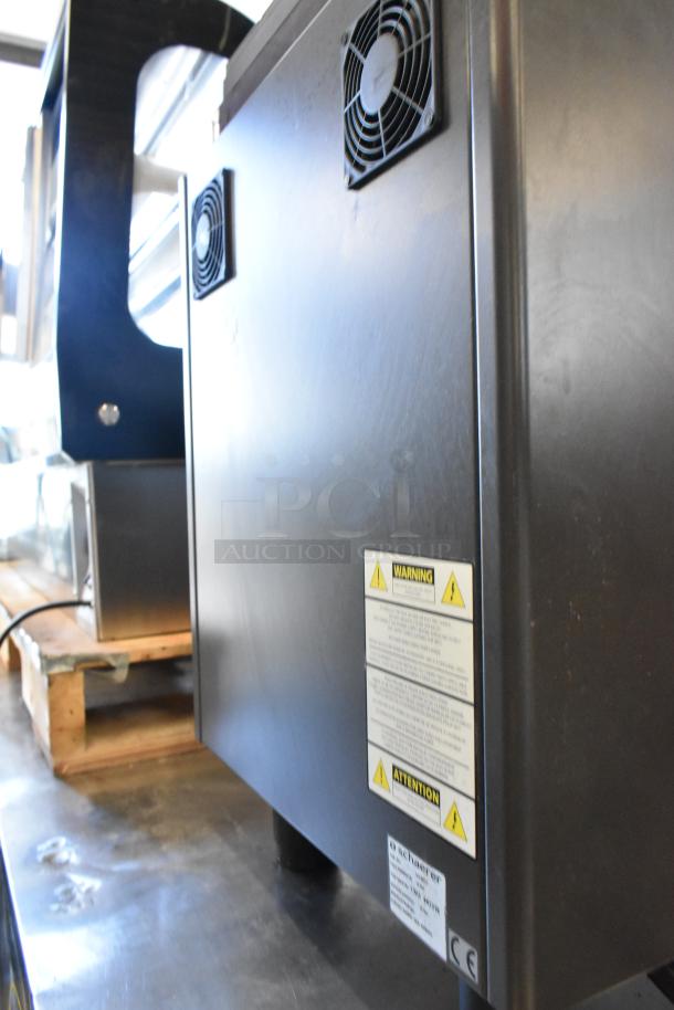 Schaerer Ambiente Metal Commercial Espresso Machine with warning labels. 210 Volts, 1 Phase, countertop model.