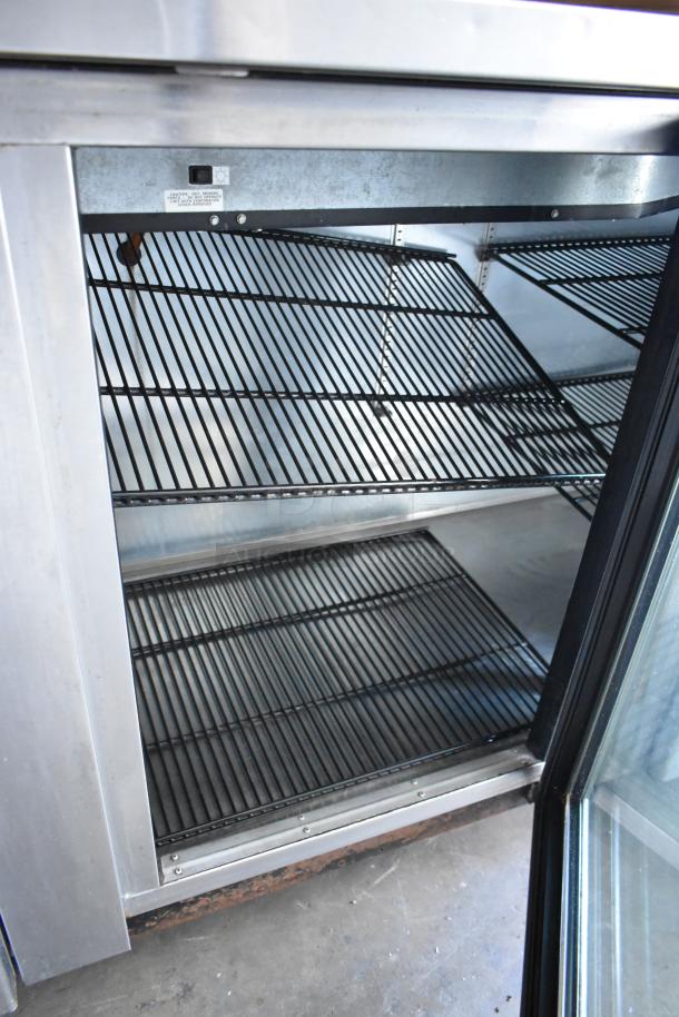 True TBB-4G-S-LD 3 Door Back Bar Cooler, metal finish, 115V, 1 phase, adjustable shelves, commercial use.