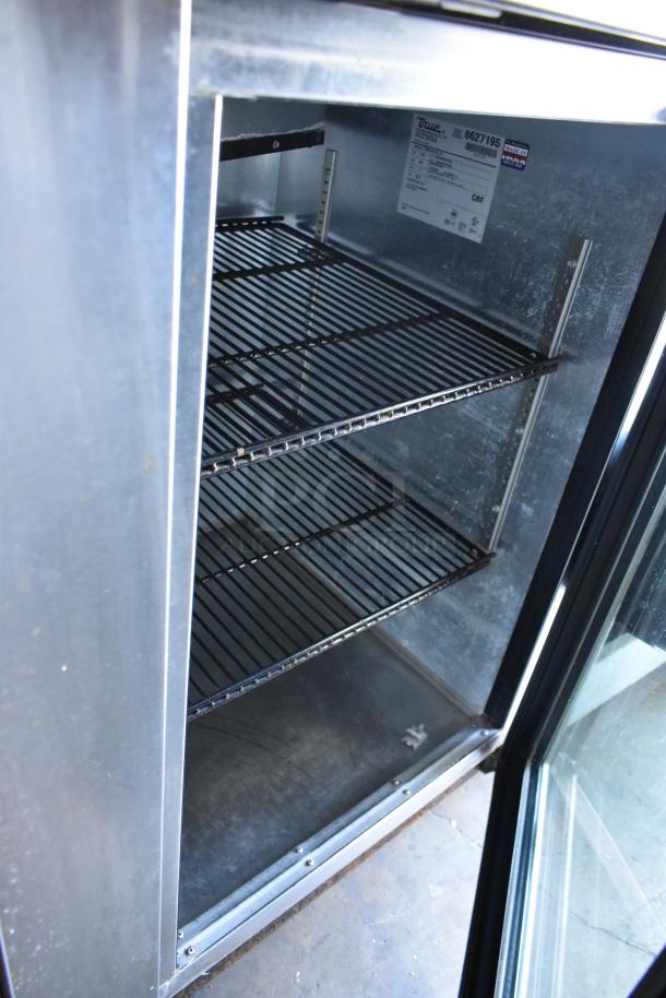 True TBB-4G-S-LD commercial 3-door back bar cooler merchandiser, metal finish, interior shelves, 115 volts, 1 phase.