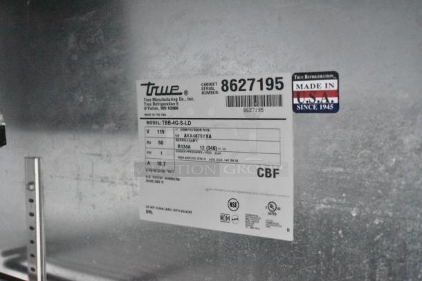 True TBB-4G-S-LD 3-door back bar cooler tag, 115V, 1-phase, serial 8627195, made in USA, R134A refrigerant, NSF certified.