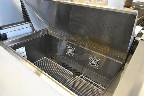 2019 Bison BST-72-30 stainless steel sandwich salad prep table in good condition, with dual fans and shelving visible. 115V, 1 phase.