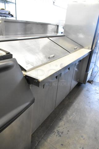 2019 Bison BST-72-30 stainless steel prep table with mega top, commercial casters, 115V, 1 phase; clean condition.