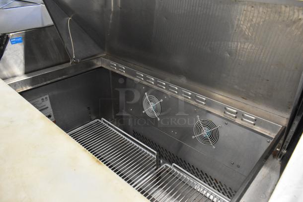 2019 Bison BST-72-30 stainless steel prep table. Features shelves, ventilation, and caster wheels, 115V, 1 phase.