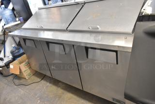 2018 True TSSU-72-30MB-ST-HC stainless steel sandwich prep table with mega top, on casters. 115V, 1 phase.