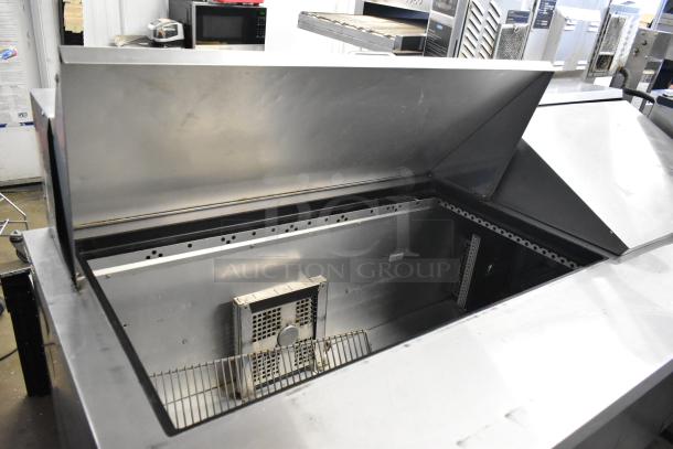 2018 True TSSU-72-30MB-ST-HC stainless steel sandwich prep table, bain marie top, on casters, 115V, 1 phase.