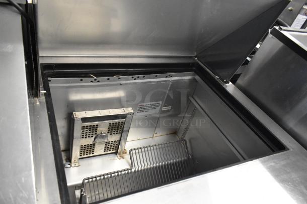 2018 True TSSU-72-30MB-ST-HC stainless steel prep table, interior view, on casters, 115V, 1 Phase, commercial use.