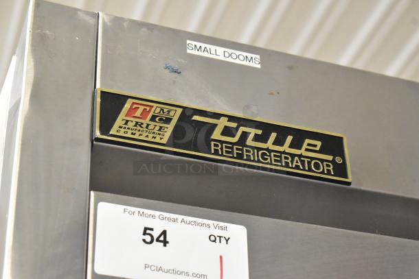 True T-72 stainless steel 3-door reach-in freezer. Features poly coated racks, commercial casters, 115 volts, 1 phase.