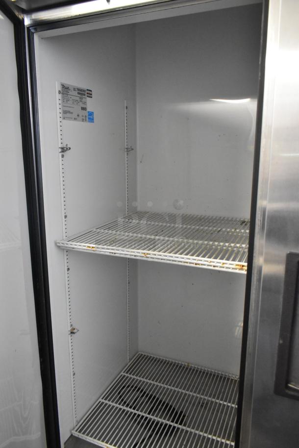 True T-72 commercial freezer with stainless steel exterior, three doors, poly-coated racks, commercial casters, 115 Volts, 1 Phase.