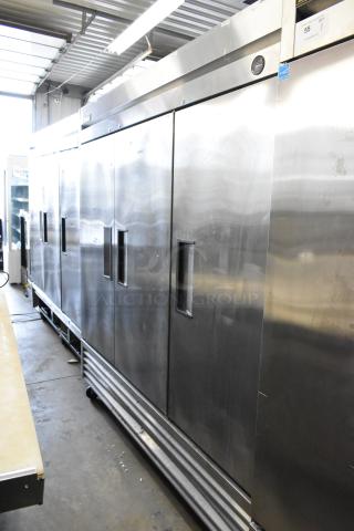 True T-72 stainless steel 3-door reach-in cooler with poly coated racks, on commercial casters. 115V, 1 phase.
