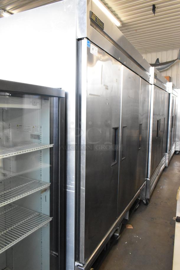 True T-72F stainless steel commercial freezer, 3 doors, poly-coated racks, commercial casters, 115V, 1 phase.