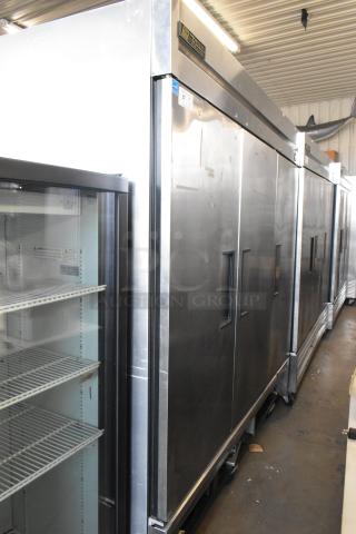 True T-72F stainless steel commercial freezer, 3 doors, poly-coated racks, commercial casters, 115V, 1 phase.