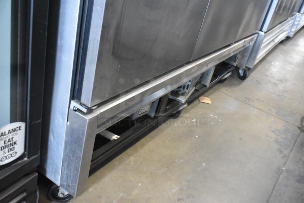 True T-72F stainless steel 3-door reach-in freezer, poly-coated racks, on commercial casters. 115 Volts, 1 Phase.