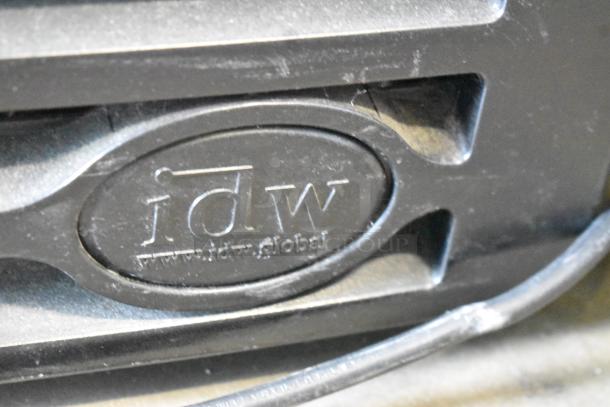 IDW G-12-F334B-HC logo close-up on metal commercial single door cooler merchandiser. Poly coated racks, 115 volts.