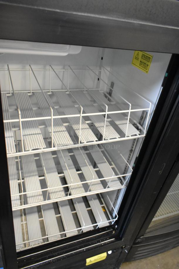 Imbera VRD41 metal commercial 2-door reach-in cooler with poly-coated racks, 115 Volts, 1 Phase, clean condition.