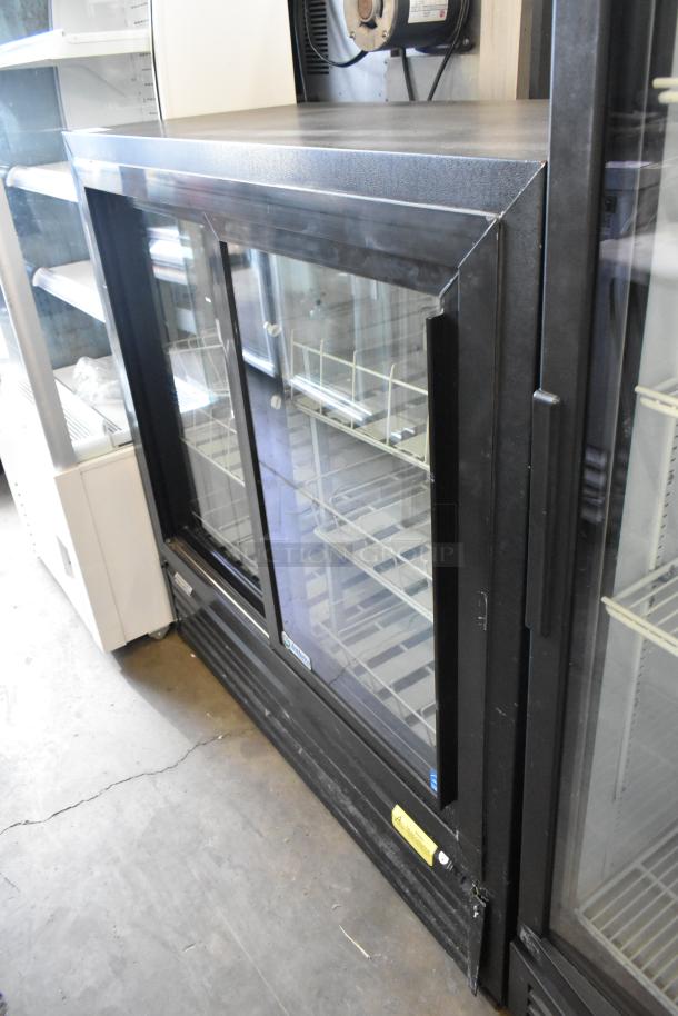 Imbera VRD41 metal commercial 2-door reach-in cooler merchandiser with poly-coated racks, 115 volts, 1 phase.
