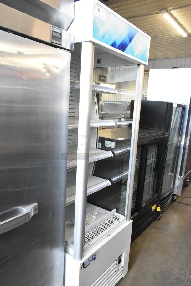 Brand new Avantco 189WVAC28HC commercial refrigerated air curtain merchandiser, white metal, 110-120V, minor scratches.