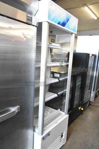 Brand new Avantco 189WVAC28HC commercial refrigerated air curtain merchandiser, white metal, 110-120V, minor scratches.