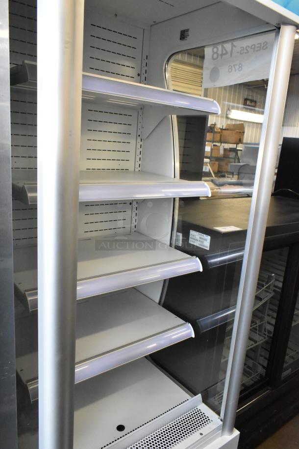 BRAND NEW Avantco 189WVAC28HC refrigerated air curtain merchandiser with metal shelves, 110-120 volts, 1 phase.