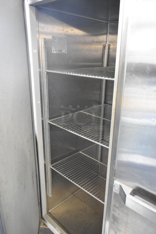 Hobart QF2 stainless steel 2-door commercial reach-in freezer with racks, 120V 1-phase, good condition.