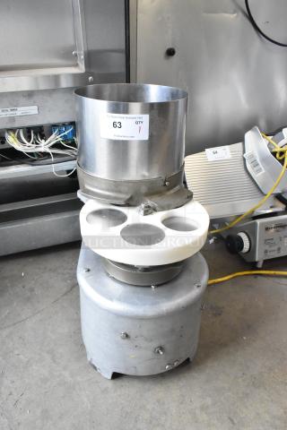 BMC Metal Commercial Countertop Hamburger Forming Machine; 115 volts, single-phase; cylindrical design; auction label visible.