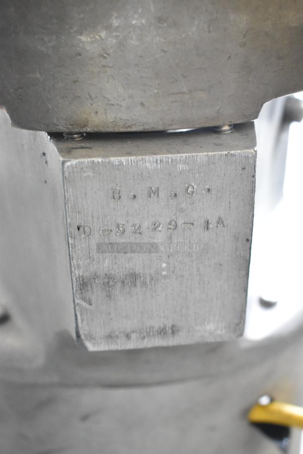 BMC Metal Commercial Countertop Hamburger Forming Machine, 115 Volts, 1 Phase, marked with "B.M.C." and model "D-5229-1A."