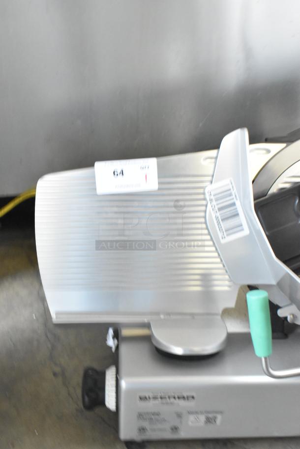 2022 Bizerba GSP H commercial countertop meat slicer, 120V, 1 phase, excellent condition. Model label and barcode visible.