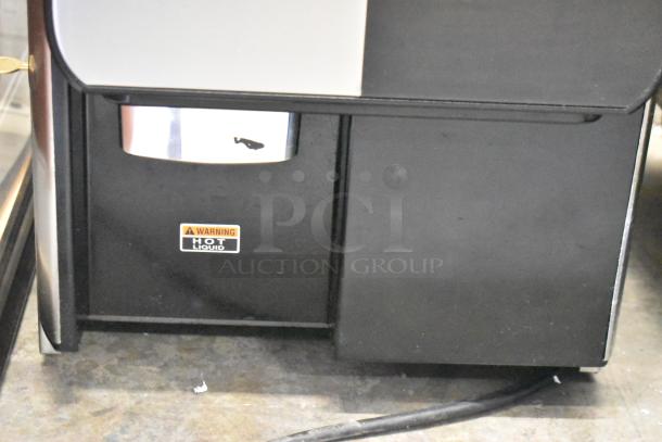 2019 Bunn Crescendo stainless steel coffee brewer, model 44300.0201, in good condition. "Warning: Hot Liquid" label visible.