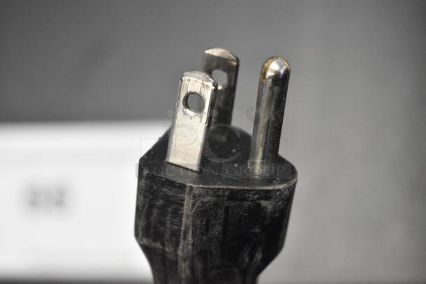 Close-up of power plug for 2019 Bunn Crescendo coffee brewer, 120 Volts, 1 Phase, stainless steel, commercial bean to cup model.