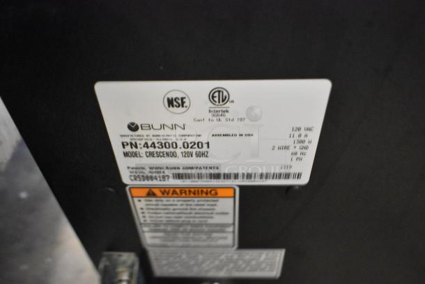 Bunn Crescendo 44300.0201 label, showing model details, certifications, and power requirements for the coffee brewer.
