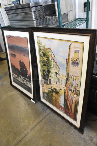 Two framed vintage-style posters featuring "Stresa-Mottarone" and "Venezia" themes in dark wooden frames.