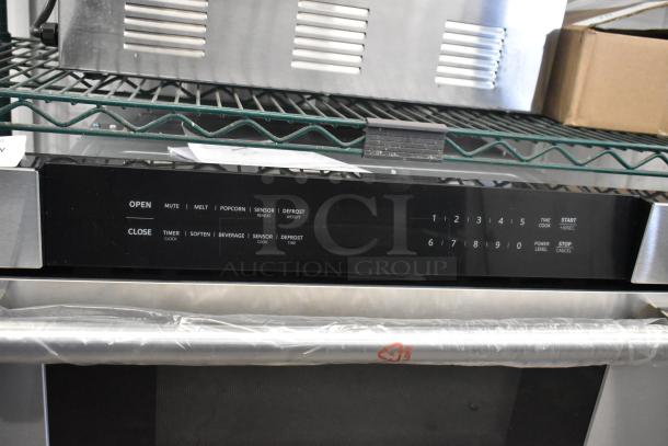 Brand new KoolMore KM-MD30-SS stainless steel microwave drawer, 1.2 cu ft, in original packaging with control panel visible.