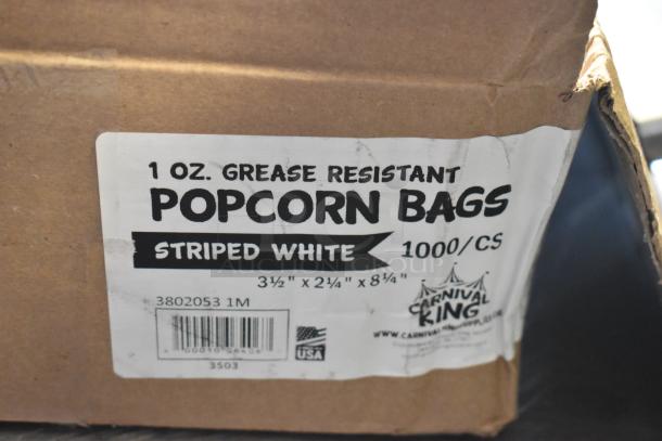 Box of 1,000 Carnival King 1 oz. grease-resistant popcorn bags, striped white, size 3 1/2" x 2 1/4" x 8 1/4".