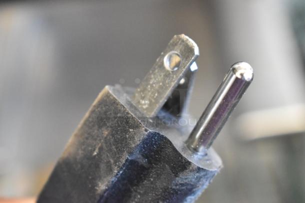 Close-up of a power plug for a 2024 Bunn LPG Commercial Coffee Bean Grinder, 120 Volts, 1 Phase.