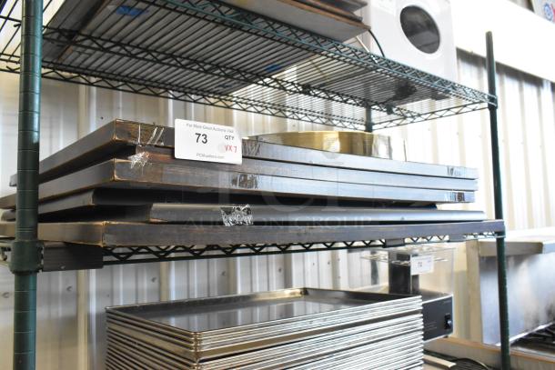 Metal shelving with wooden planks and trays, auction lot number 73, marked for sale by PCI Auctions.