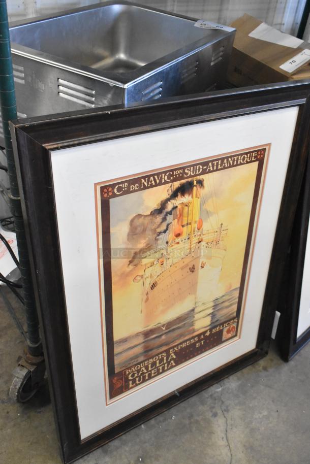 Framed vintage ship poster, Cie de Navigation Sud-Atlantique, near a metal bin. Part of 7-item auction lot.